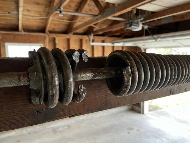 Broken Garage Door Spring Repair work in progress